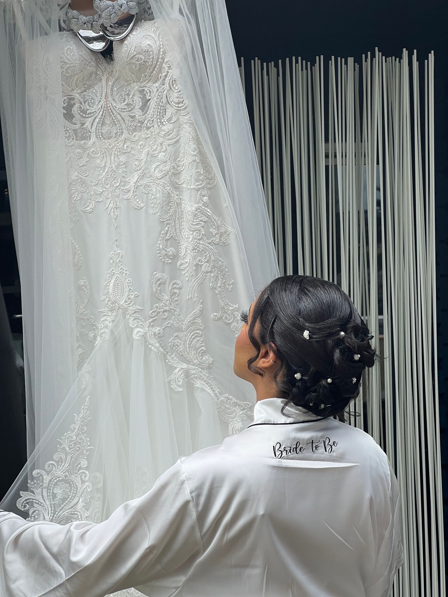 Bridal hairstyle with a veil, seen from behind